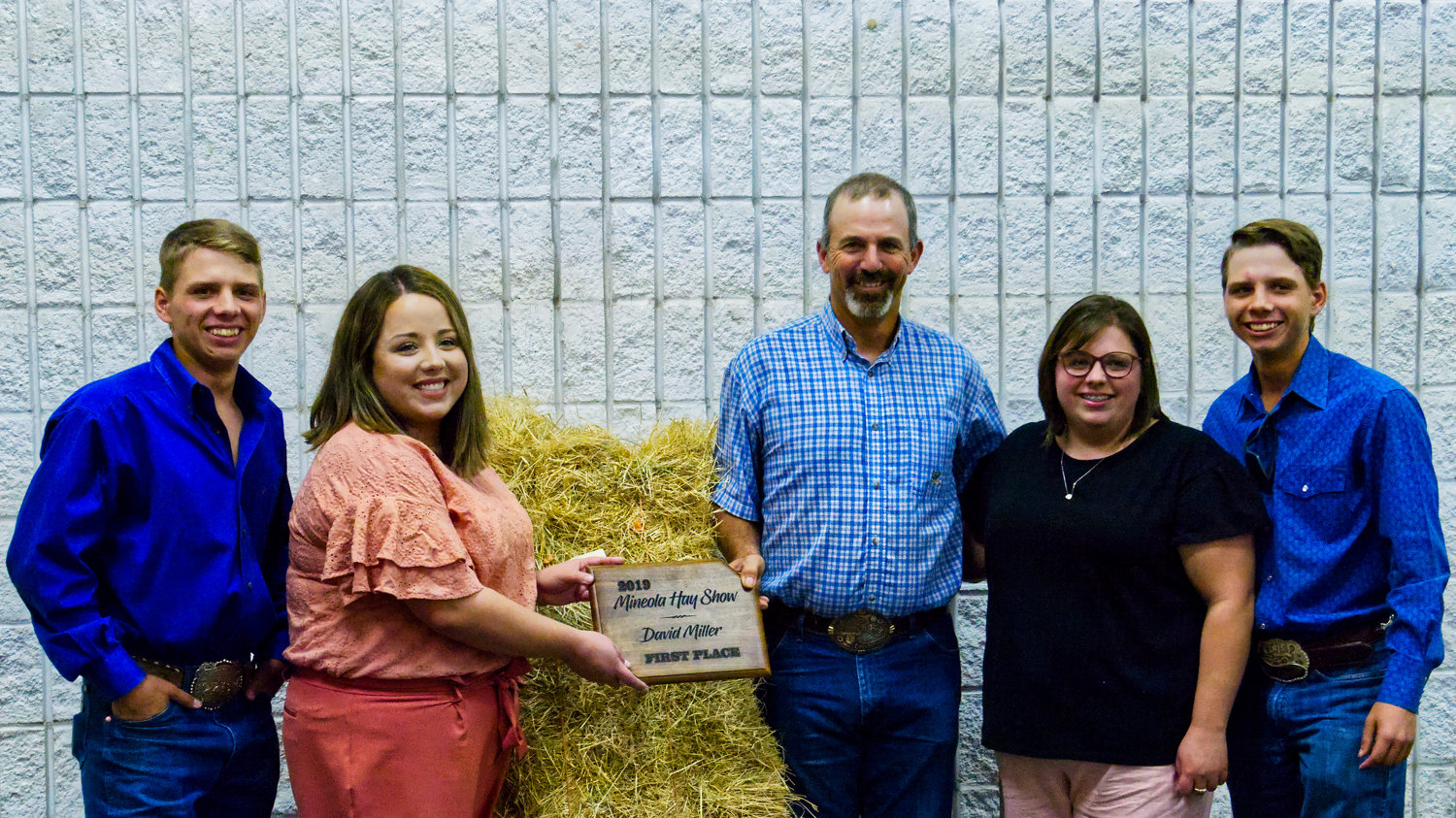 Mineola Packing Company was the winning bidder of $3,100 for the first place hay show entry of David Miller.